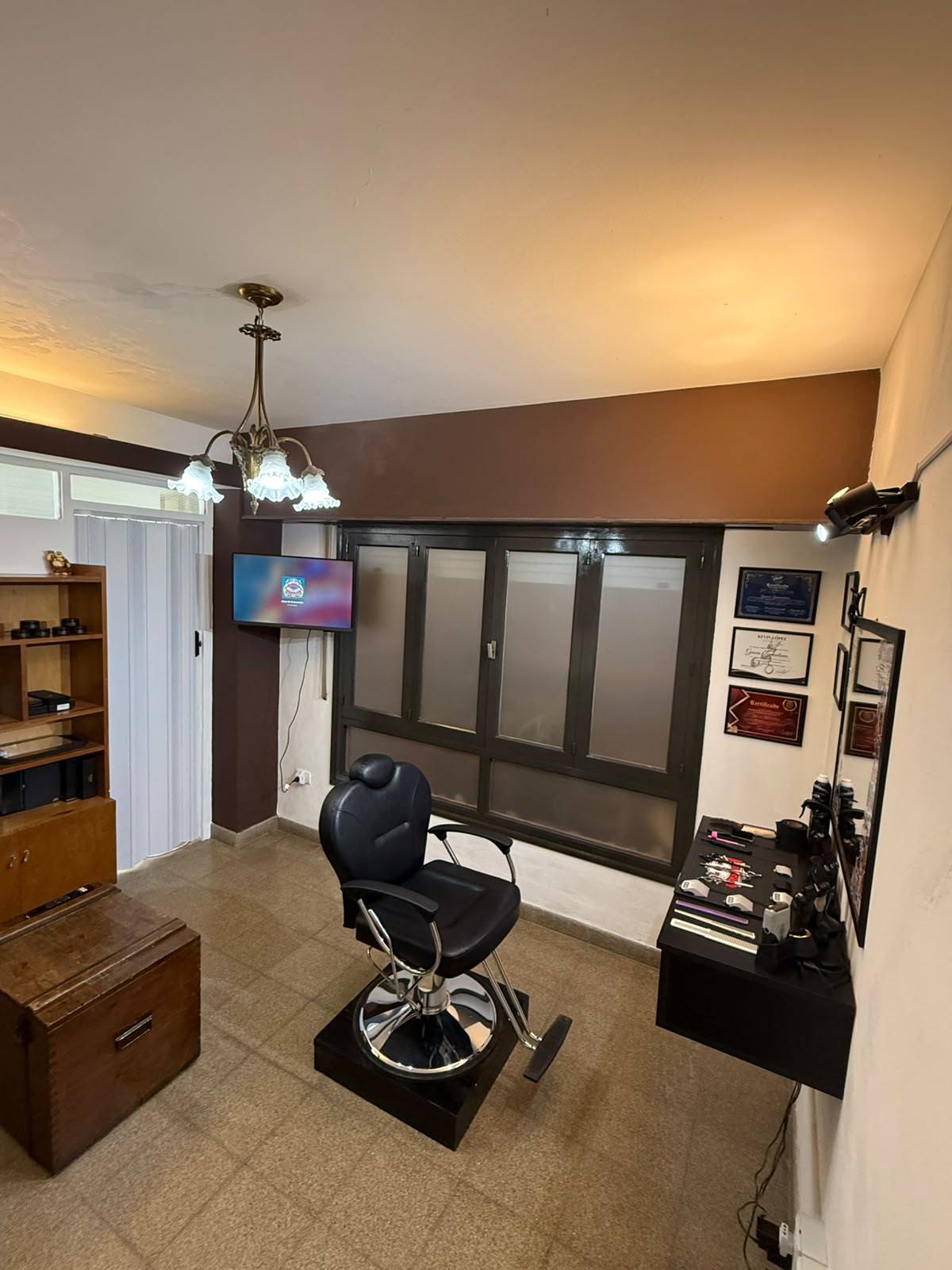 Interior de Dostrentidos Barbería en Villa María